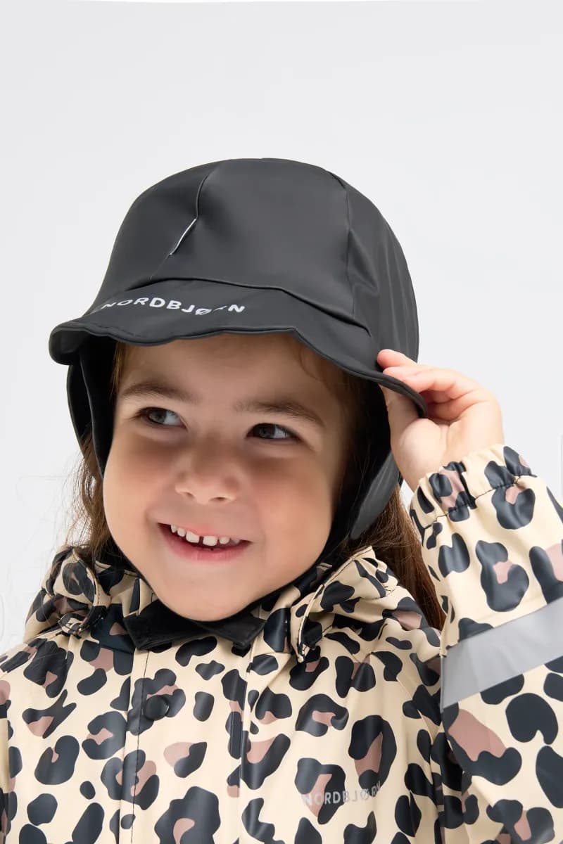 Nordbjørn Korsö Fodrad Regnmössa, Solid Black, 0–2 år