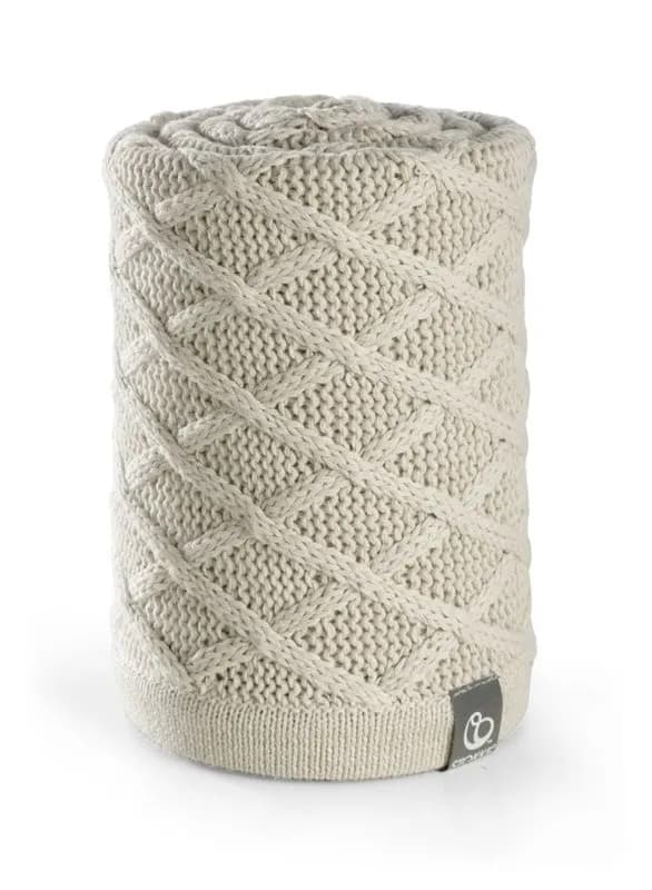 Stokke stickad filt med tryckknapp, cable cream